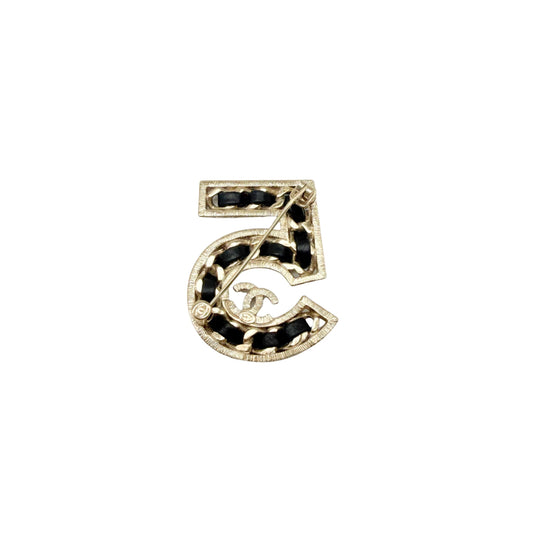 Chanel No.5 Black and Gold Brooch