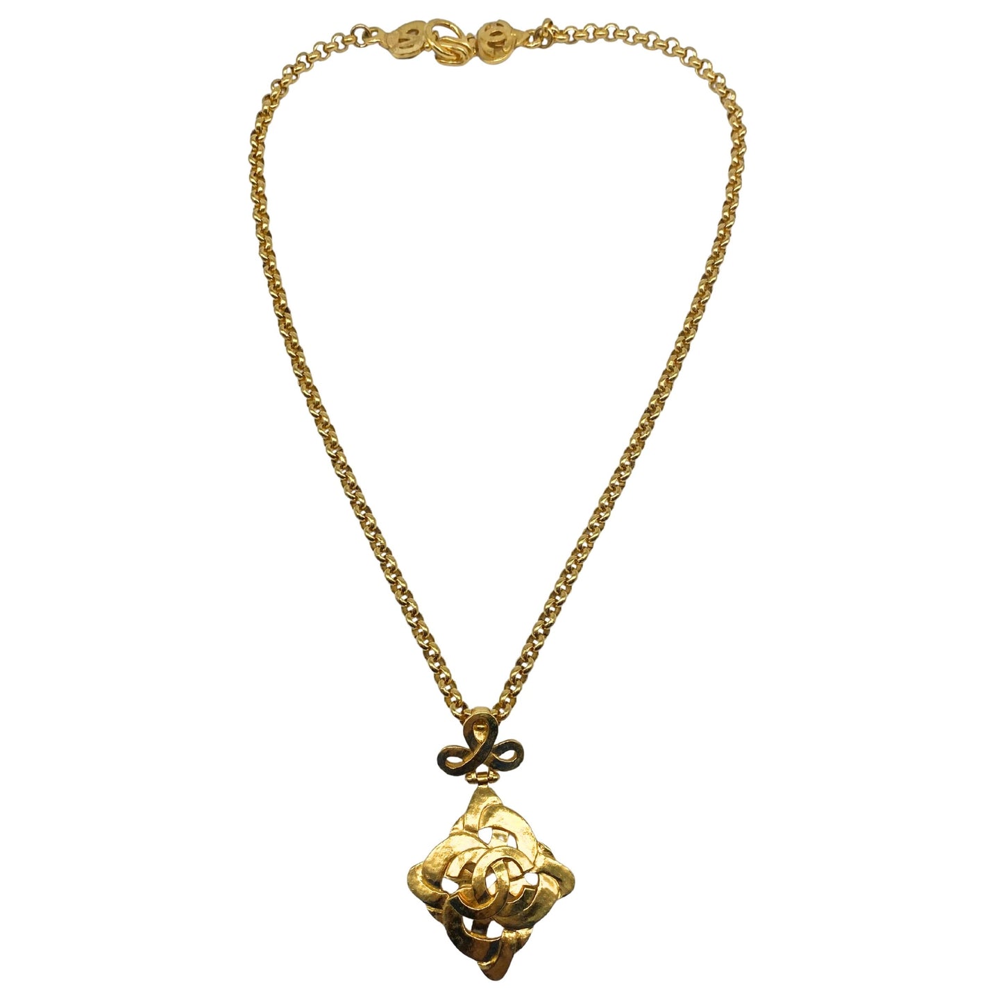 Chanel Gold Tone CC Logo Swirl Cross Necklace