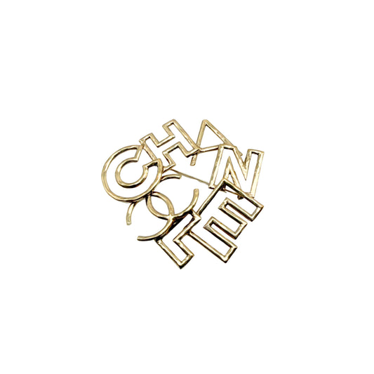Chanel Hammered Logo Letter Brooch in Light Gold