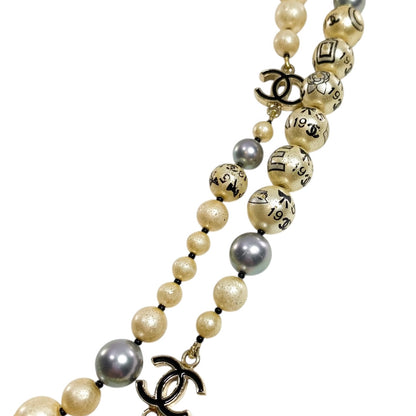 Chanel Pearl Printed CC Logo Necklace