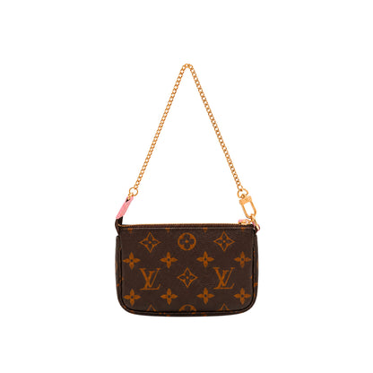 Louis Vuitton Monogram Rose Traveler Mini Pochette