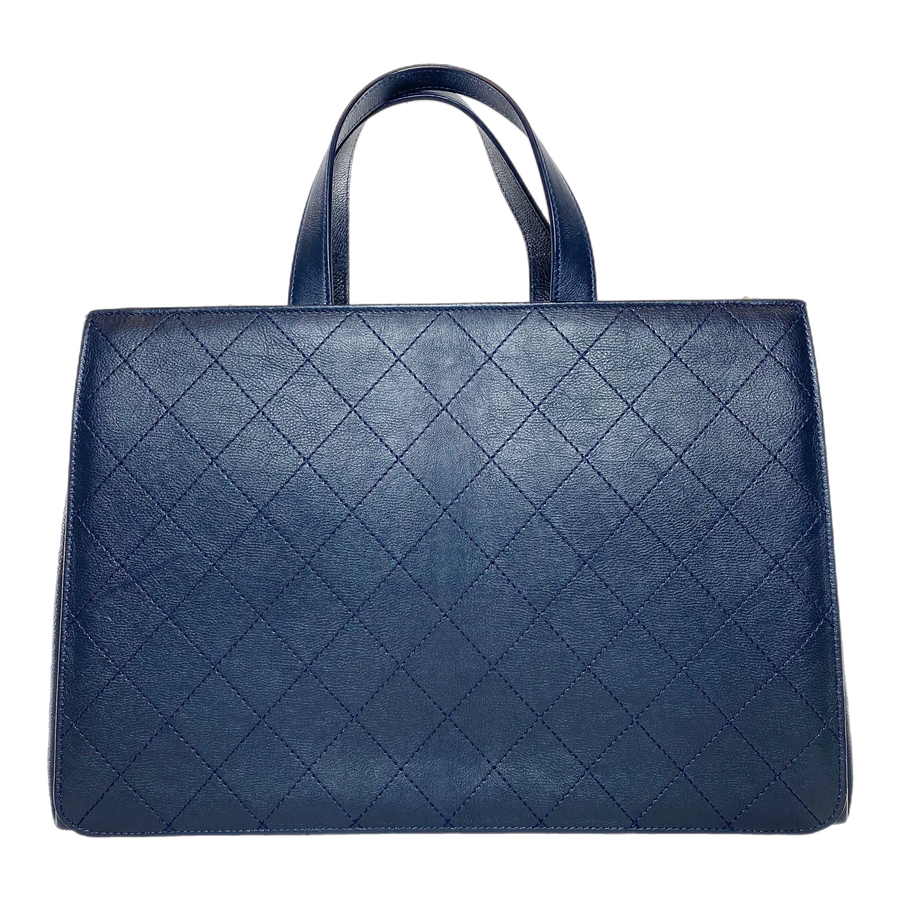 Chanel Large Navy Stitched Straight Lines Shopping Tote – Consign Chanel Large Navy Stitched Straight Lines Shopping Tote – Consign
