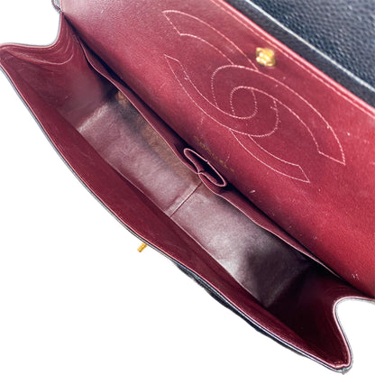 Chanel Black Quilted Caviar Maxi Double Flap Bag