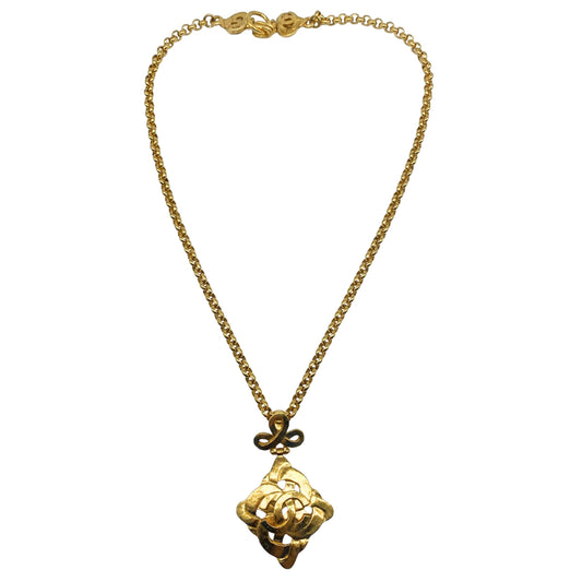 Chanel Gold Tone CC Logo Swirl Cross Necklace