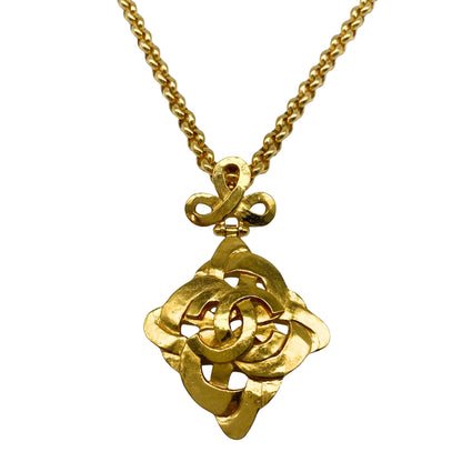 Chanel Gold Tone CC Logo Swirl Cross Necklace