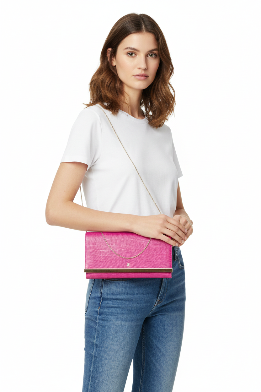Carolina Herrera pink clutch on model