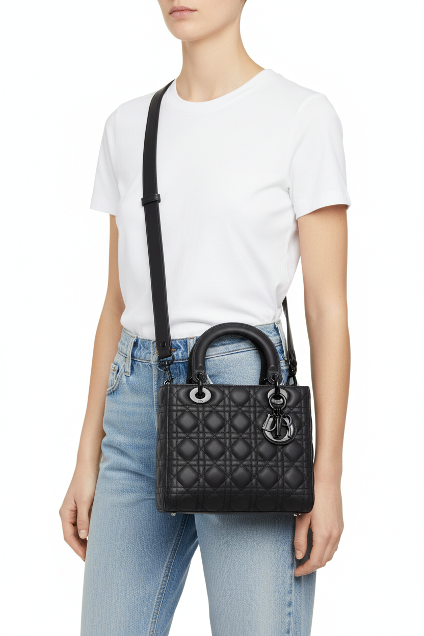 Handbag worn crossbody with plain black strap