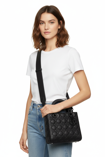 Handbag worn crossbody with thick leather strap