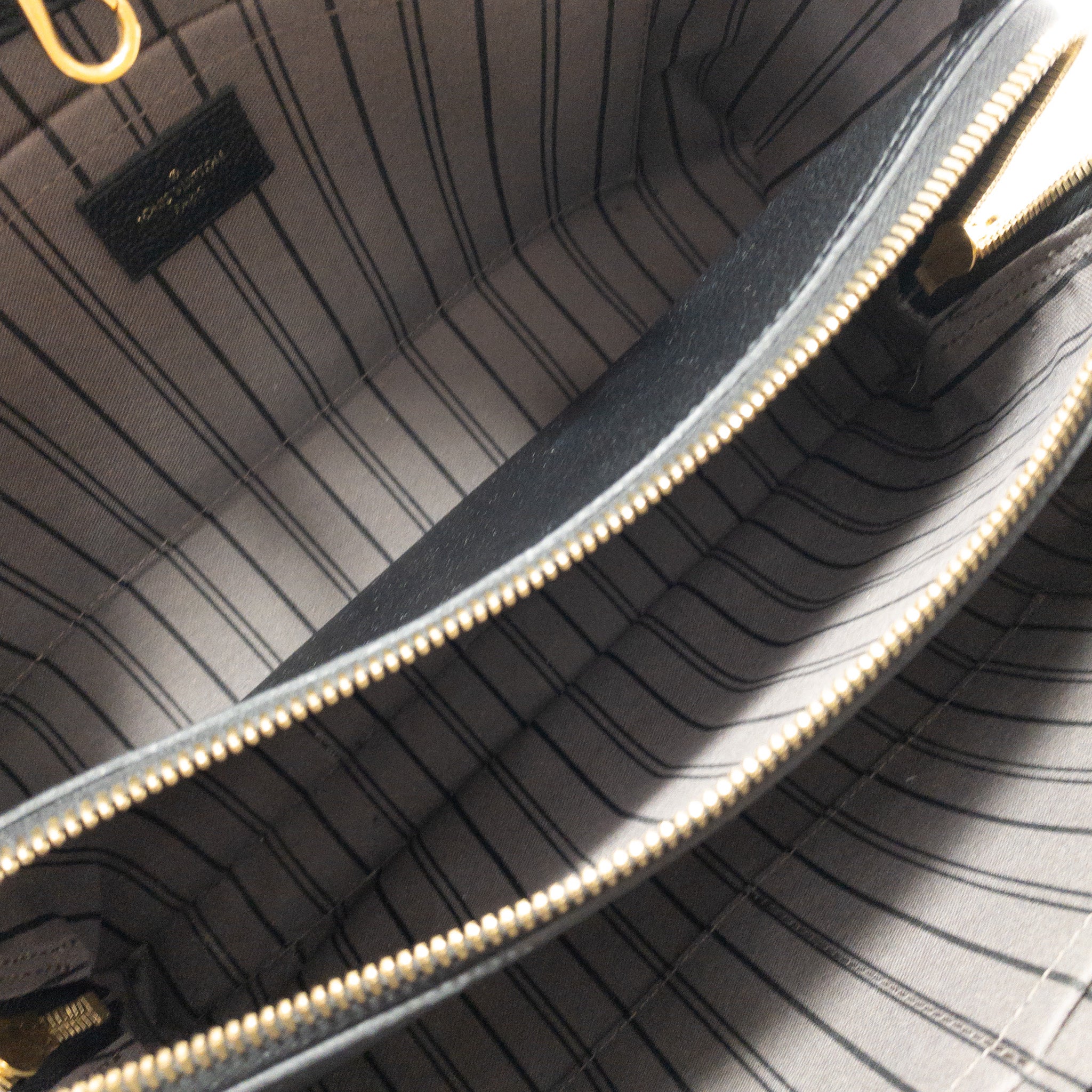 Louis Vuitton Black Empreinte Leather Montaigne
