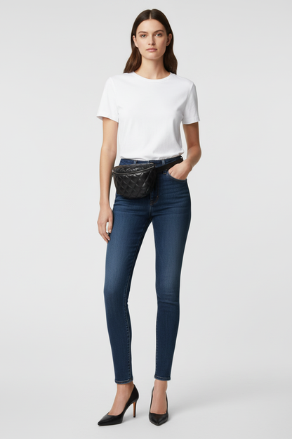 Model in jeans and t-shirt with Chanel Uniform Black Quilted Waist Bag
