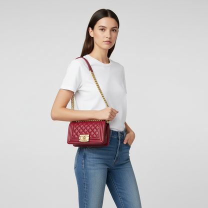 Model wearing t-shirt and jeans with Chanel Red Mini Boy Bag