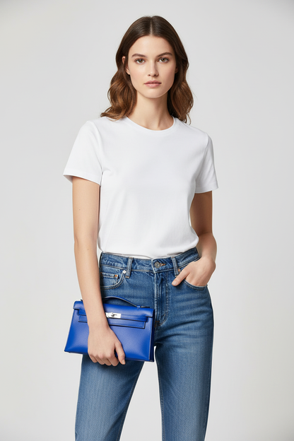 Model with Hermes Kelly Pochette Bleu Electrique - no strap
